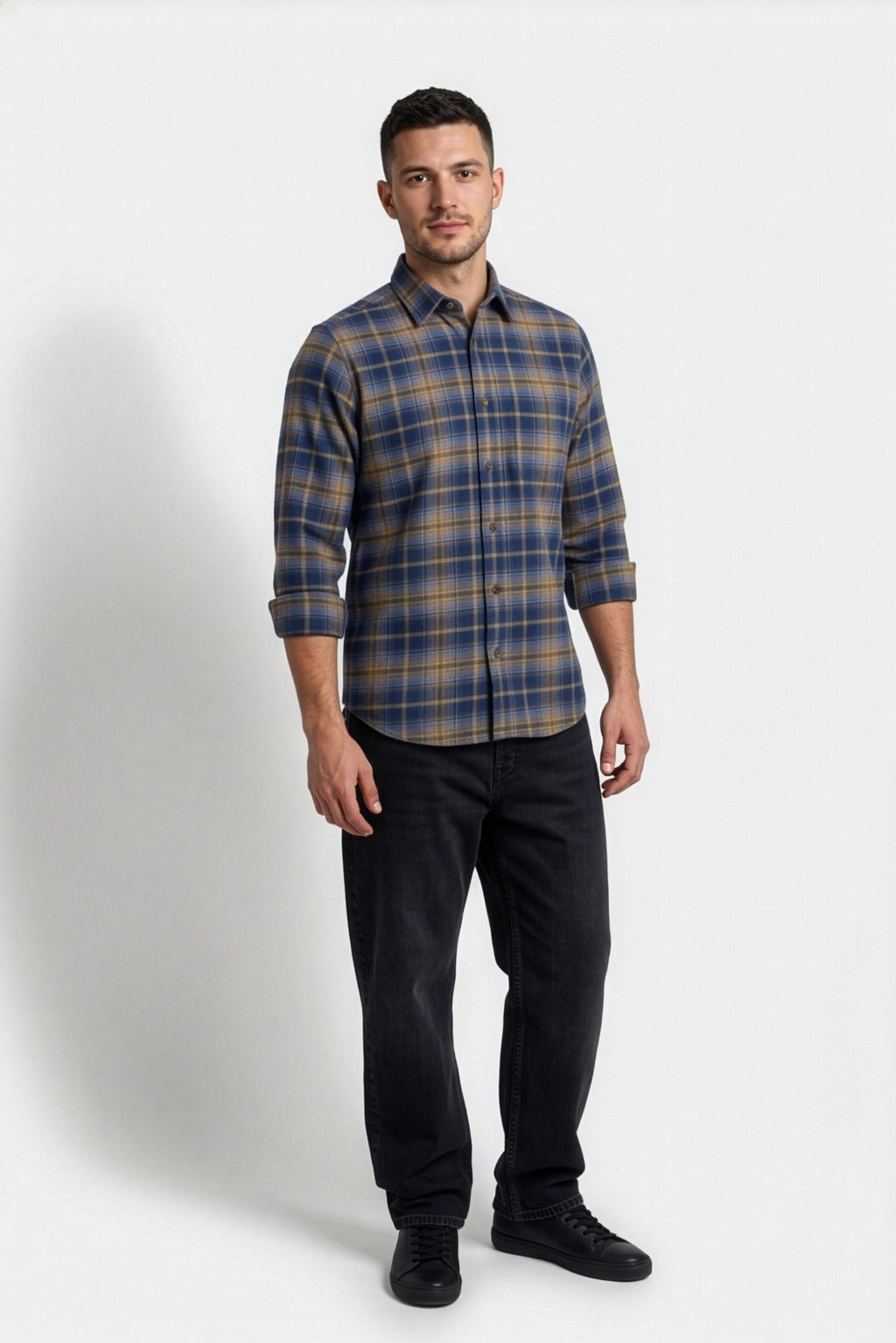 Front view of men's navy and tan plaid flannel shirt
