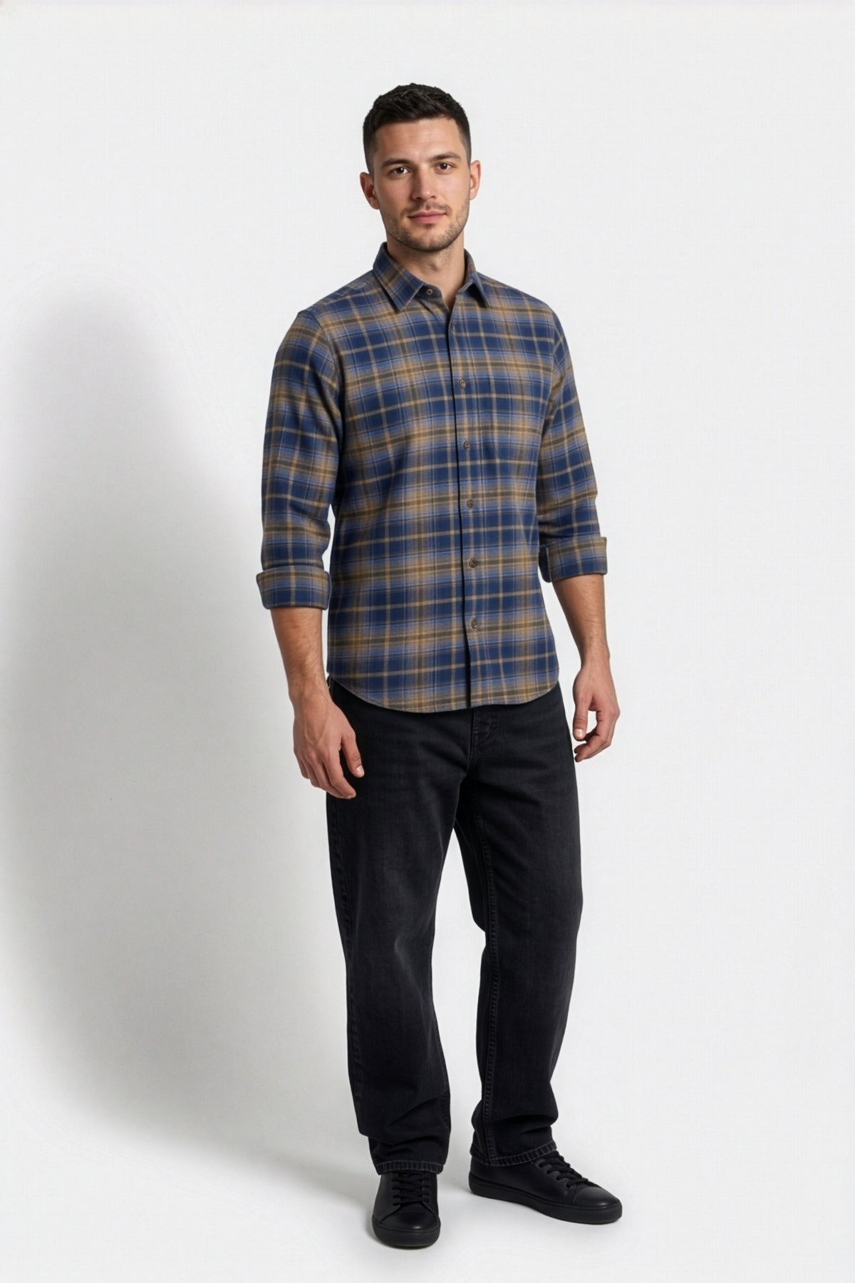 Front view of men's navy and tan plaid flannel shirt