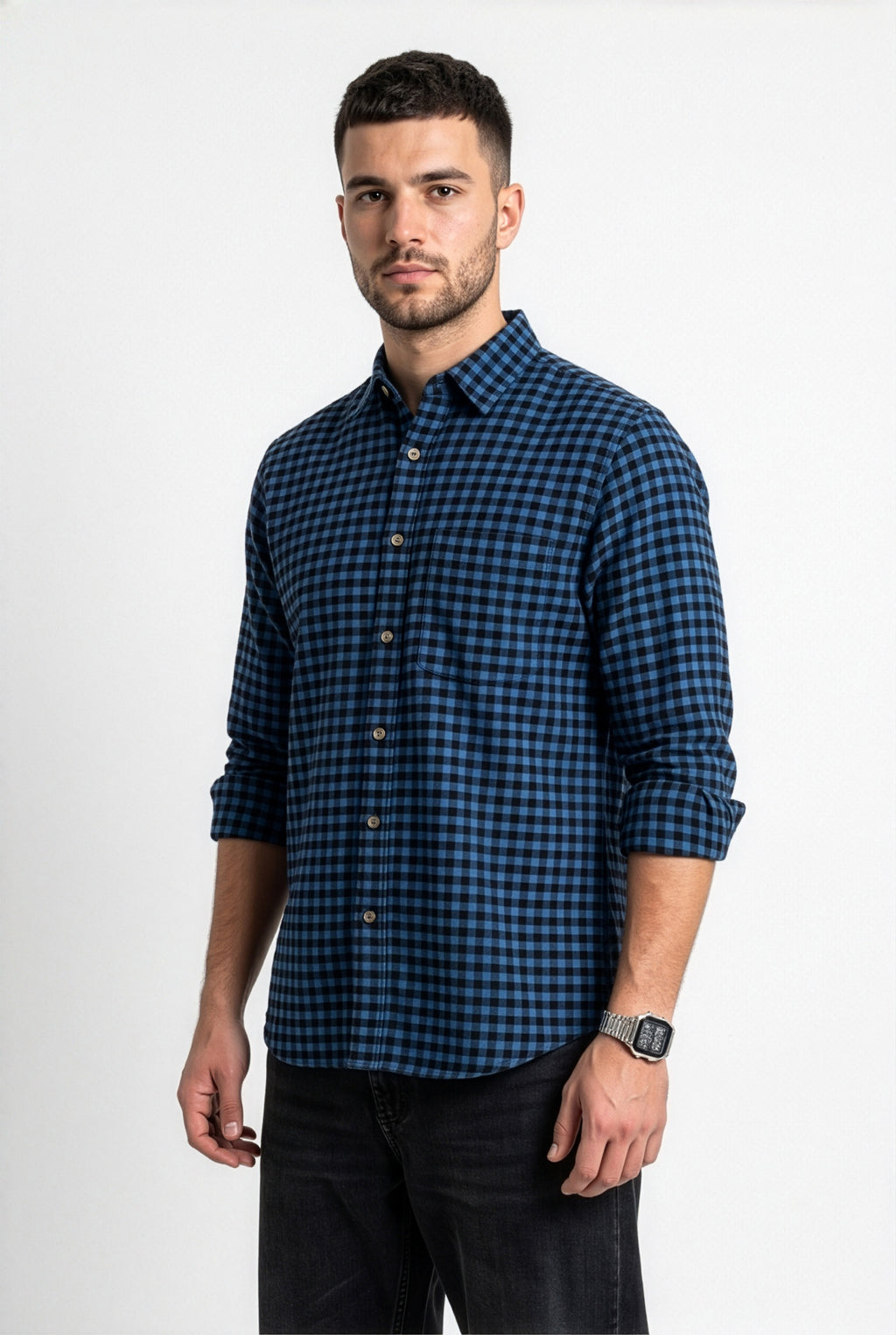 Three-quarter front view of men's blue and black gingham flannel shirt
