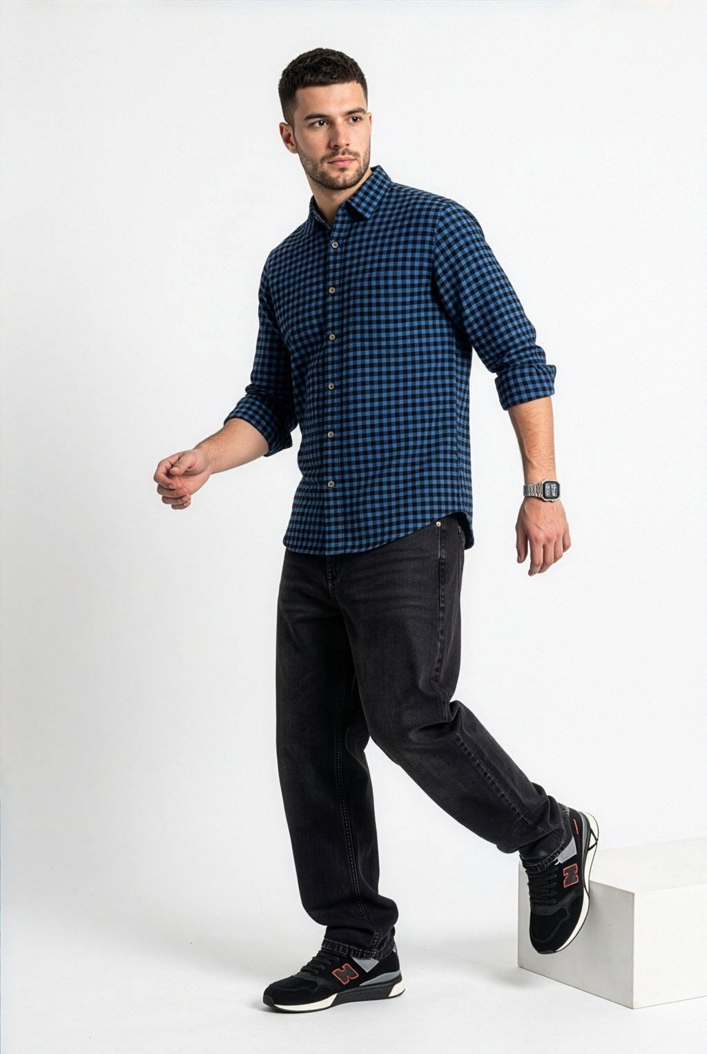 Full-length front view of men's blue and black gingham flannel shirt