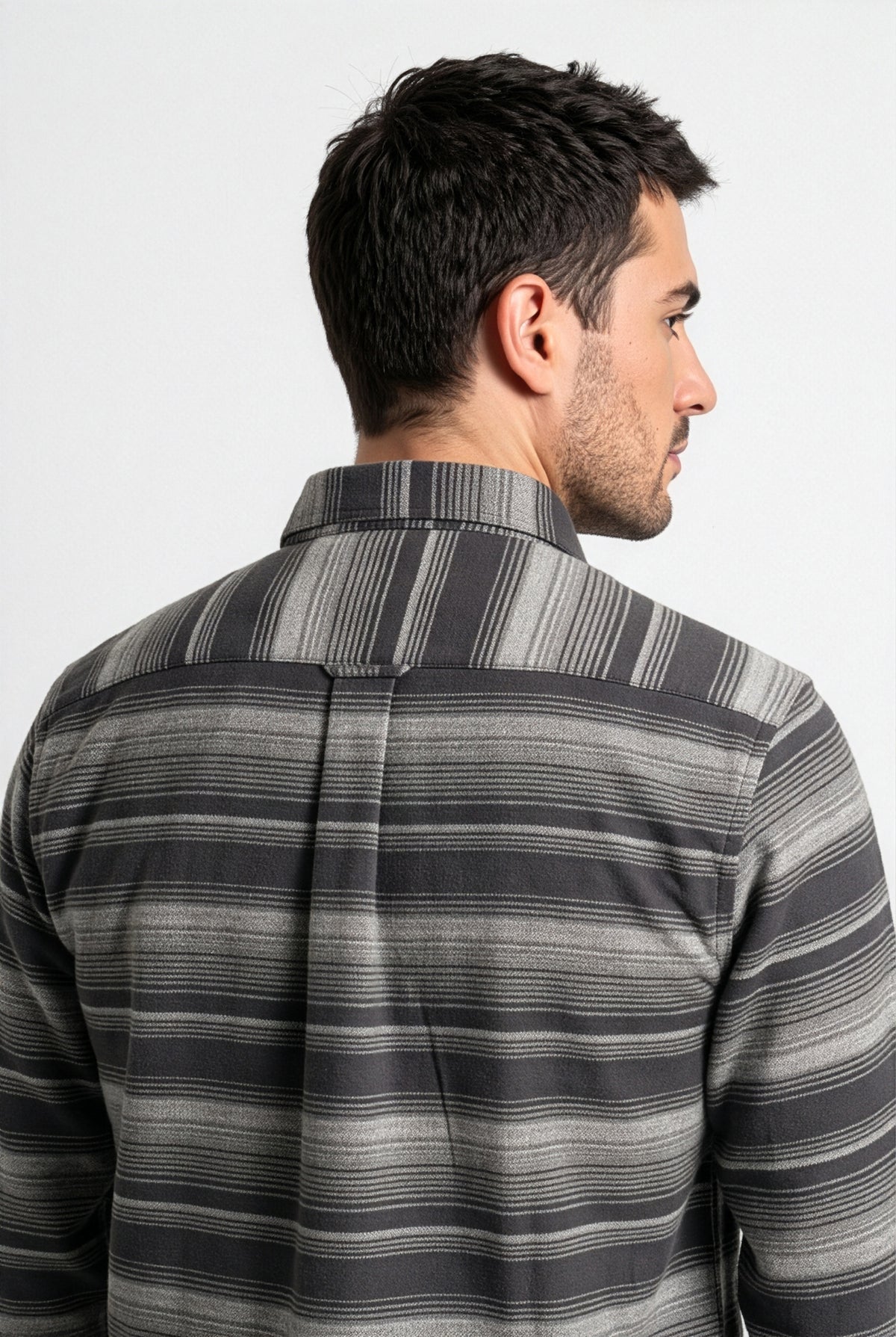Back yoke and centre pleat detail of charcoal and grey striped flannel shirt