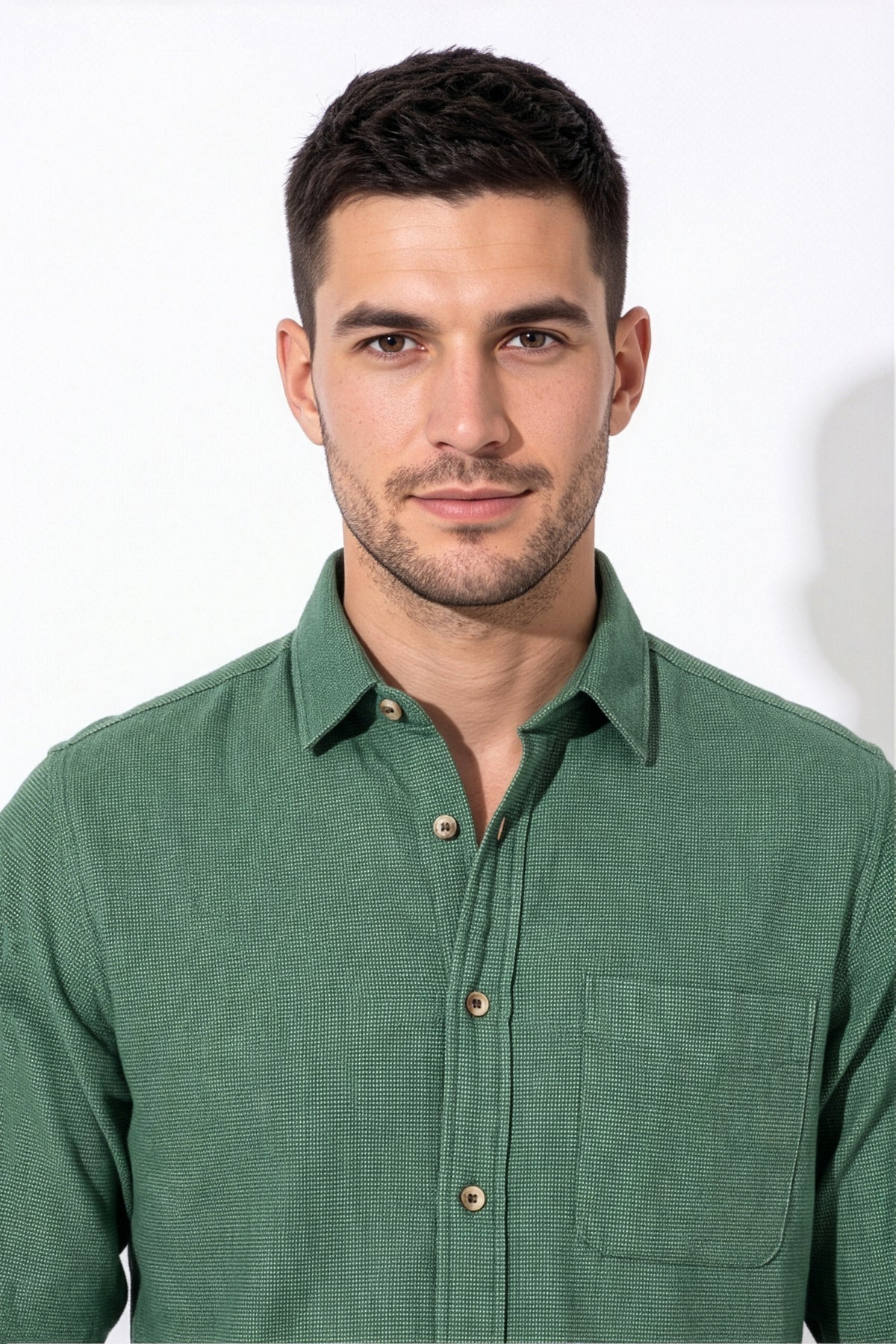 Collar and chest pocket detail of green micro-check flannel shirt