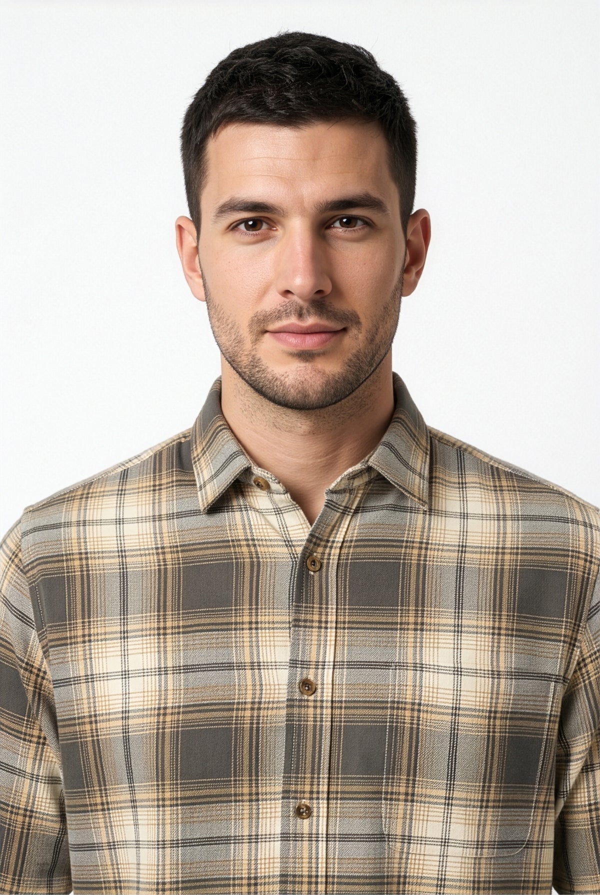 Collar and chest pocket detail of grey and beige plaid flannel shirt