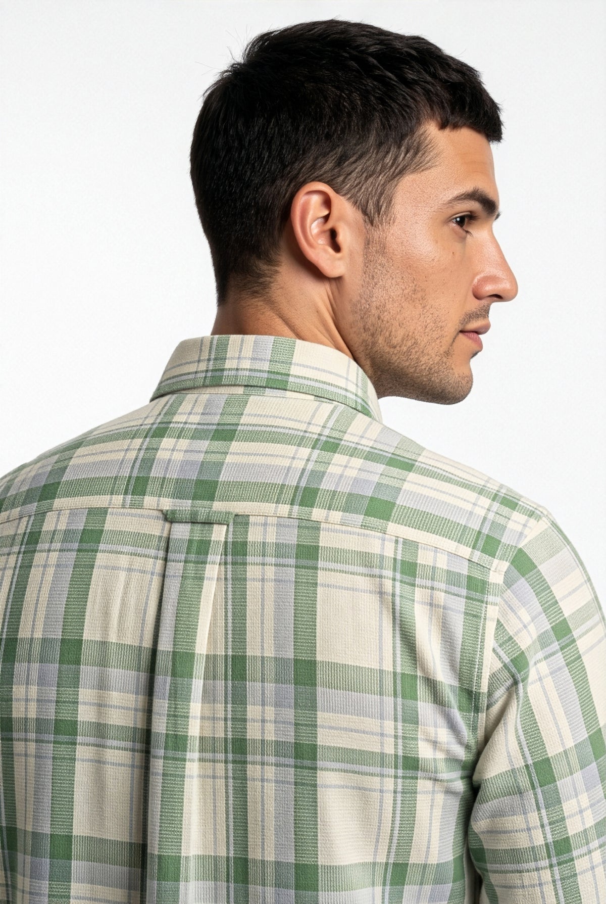 Back yoke and centre pleat detail of cream and green plaid cotton dobby shirt