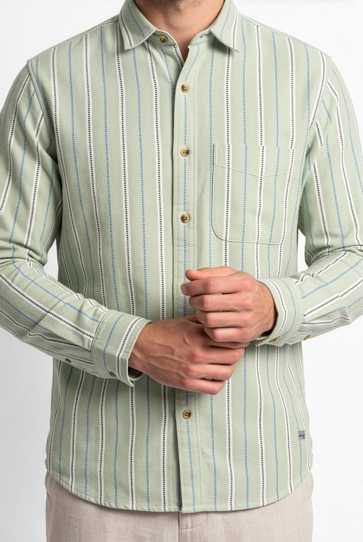 Vertical stripe and chest pocket detail of sage green cotton dobby shirt