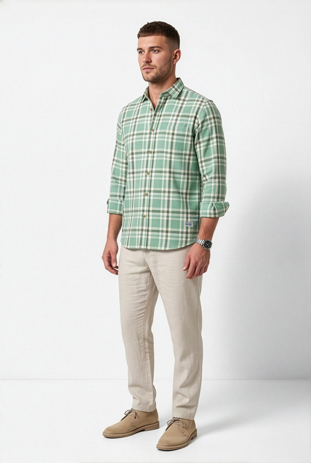 Full-length front view of men's mint green and cream plaid cotton dobby shirt