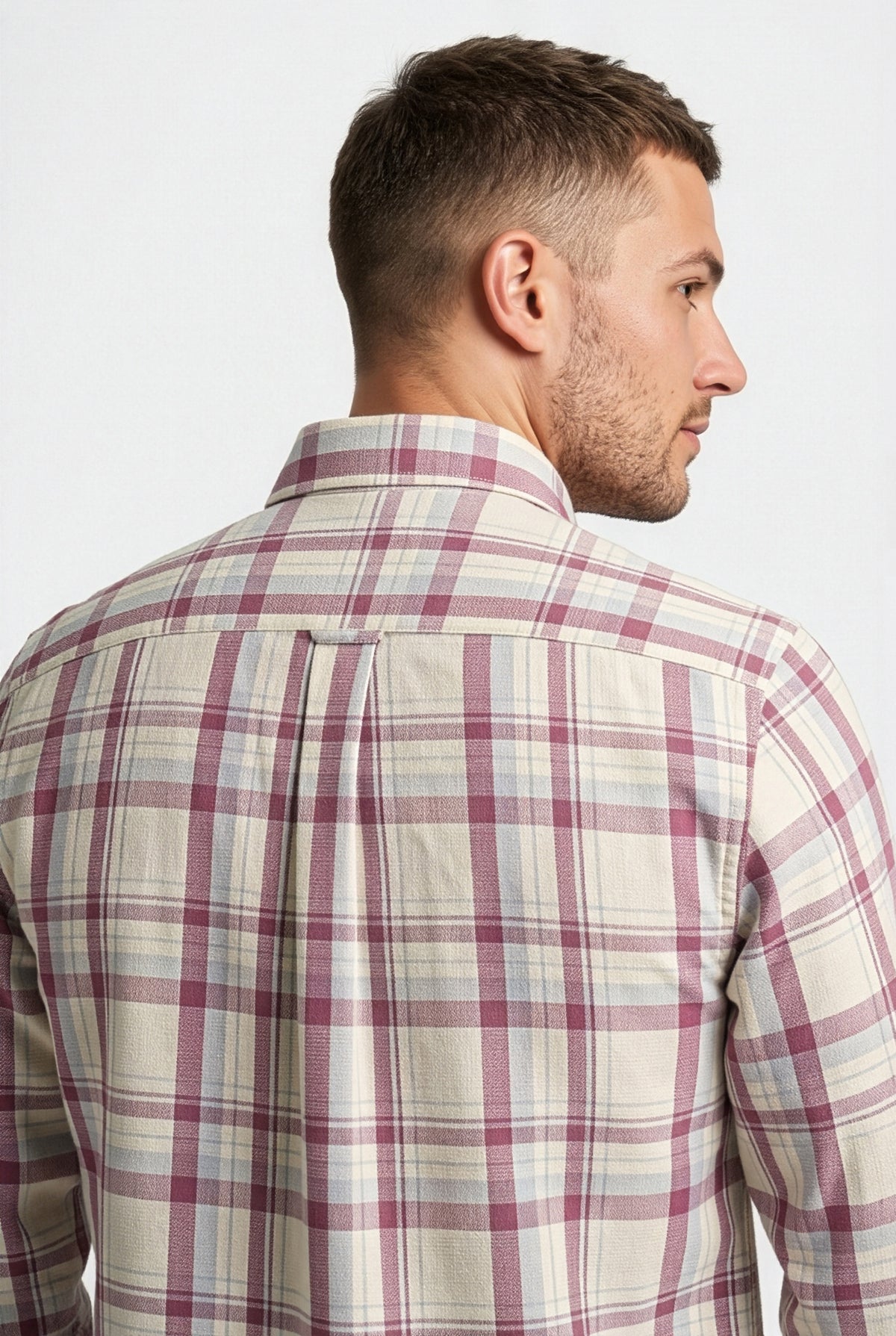 Back yoke and centre pleat detail of cream and mauve plaid cotton dobby shirt