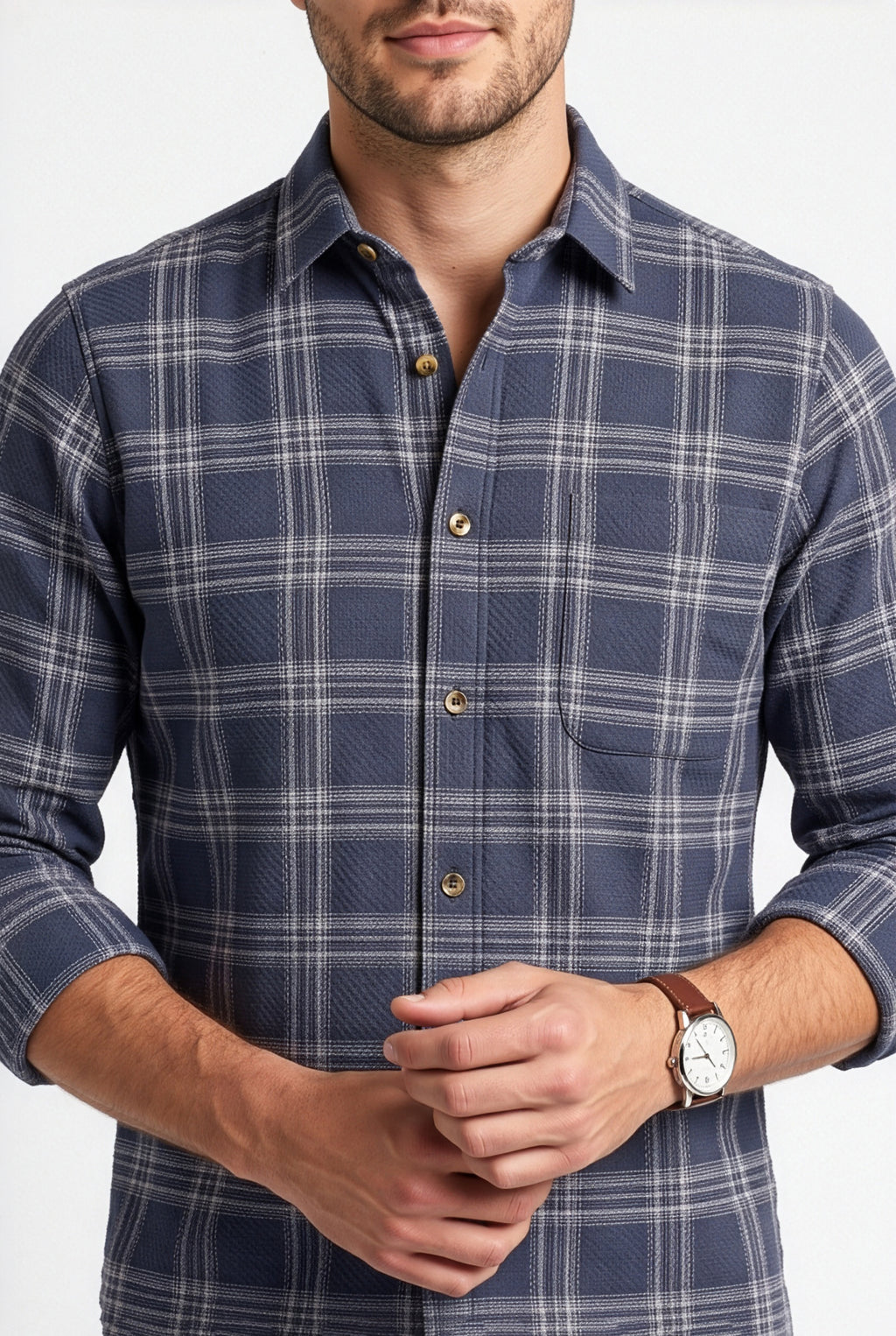 Collar and chest pocket detail of navy and grey plaid cotton dobby shirt
