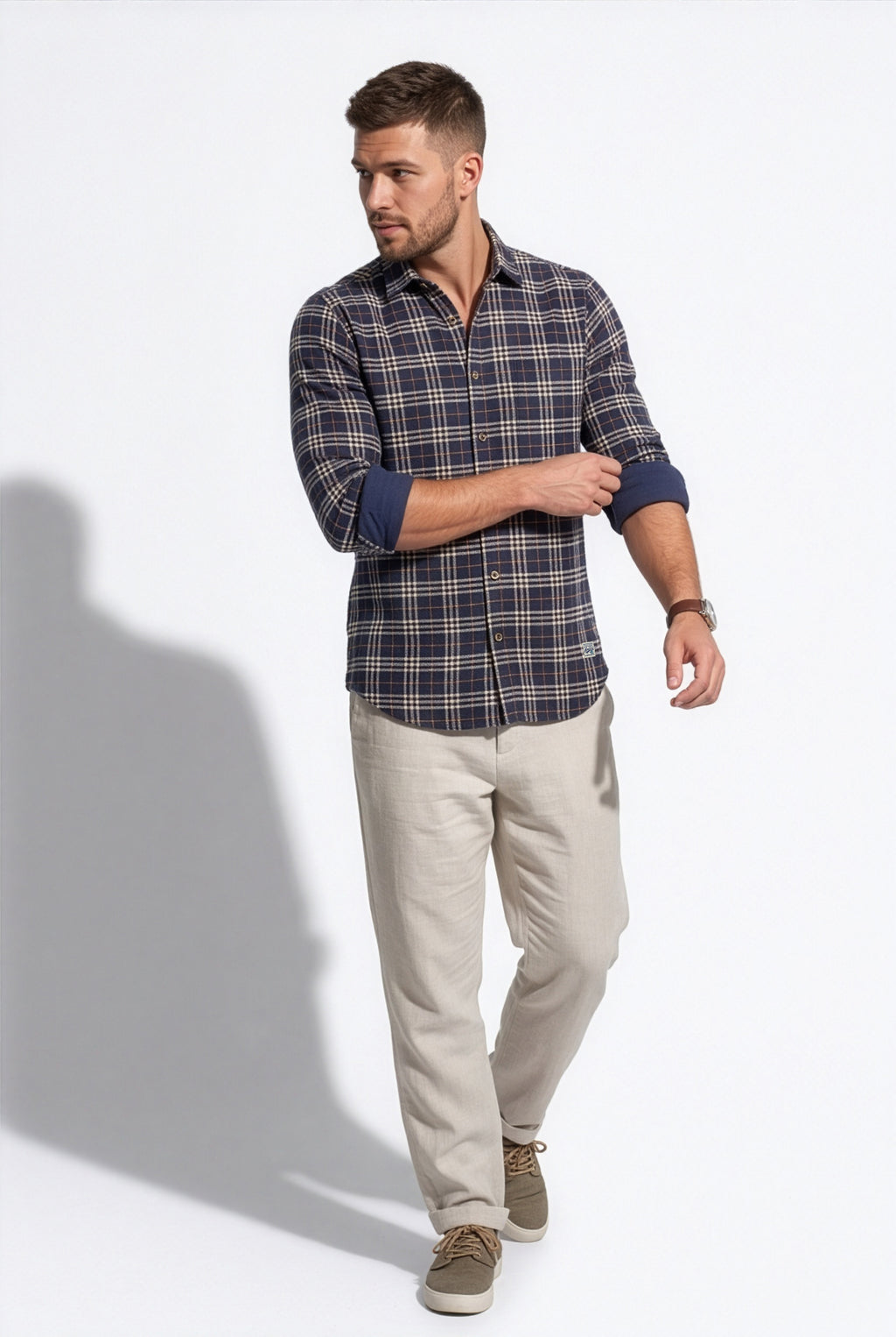 Rear three-quarter view of men's navy and cream plaid cotton dobby shirt