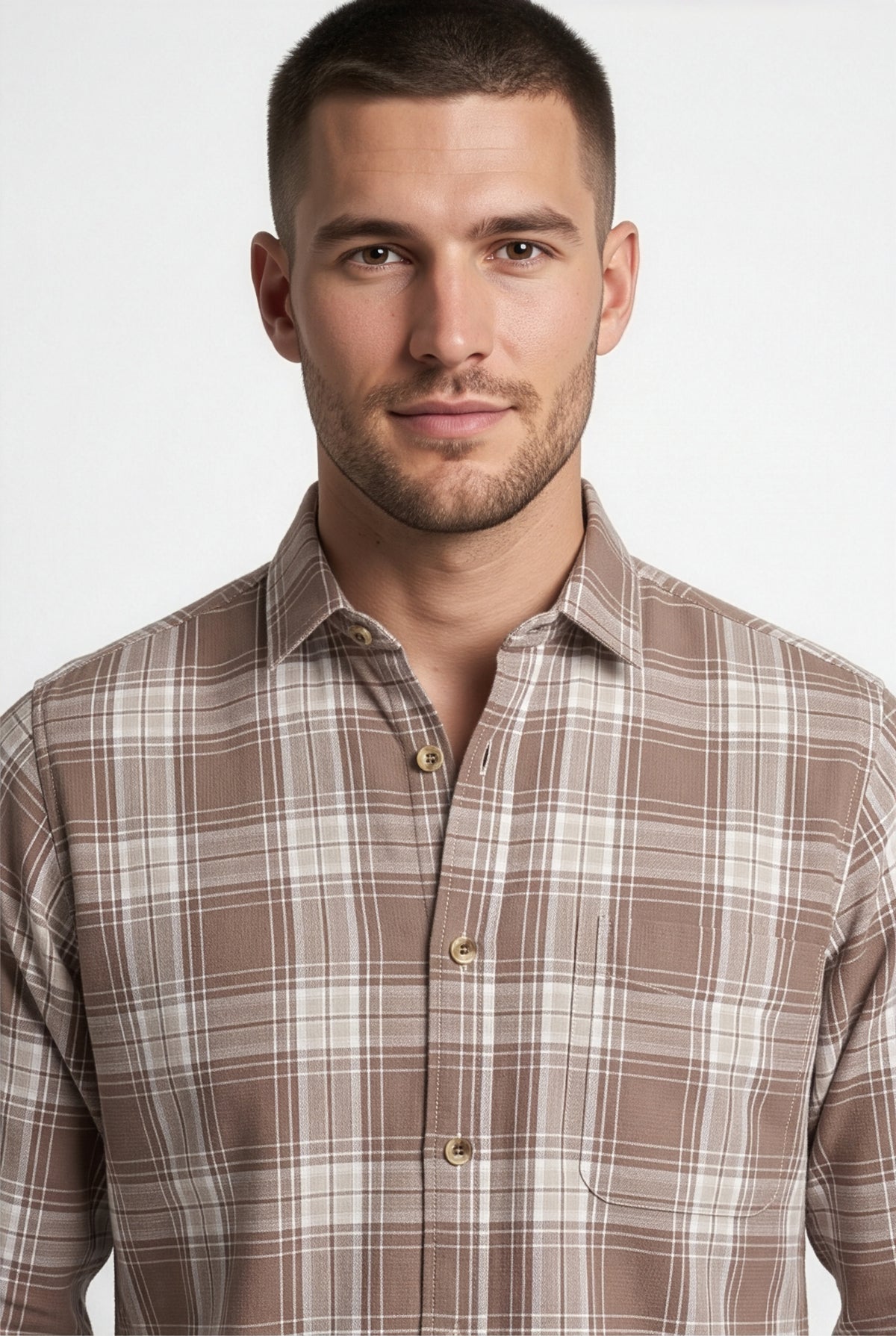 Collar and chest pocket detail of brown and cream plaid cotton dobby shirt