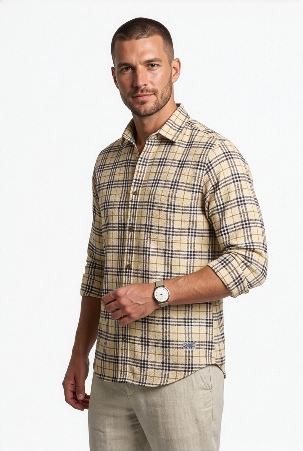 Full-length front view of men's beige and black plaid cotton dobby shirt