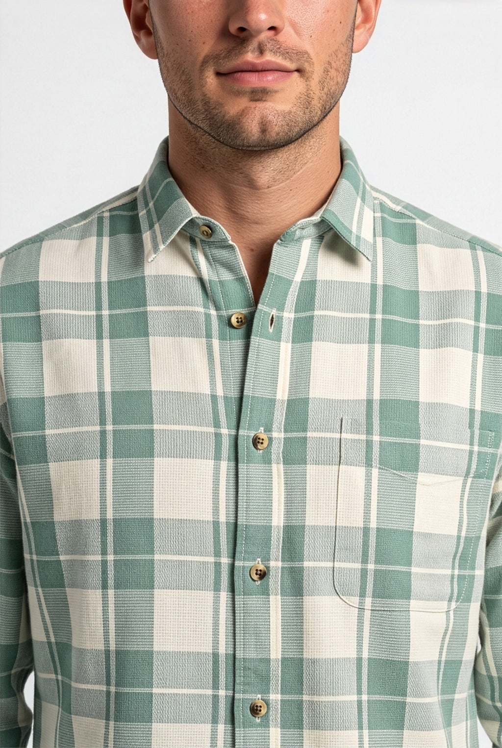 Collar and chest pocket detail of sage green and cream plaid cotton dobby shirt