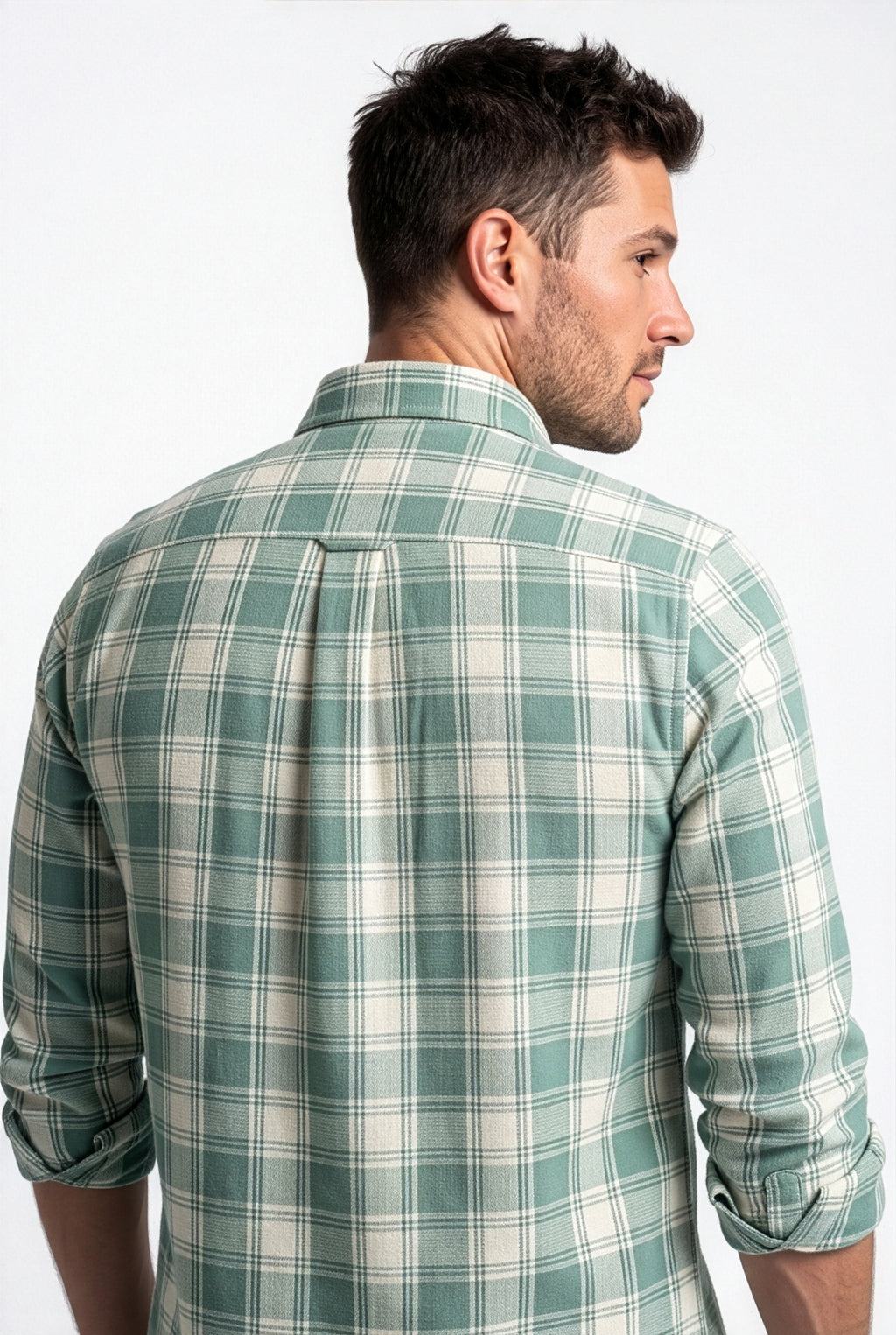 Back yoke and centre pleat detail of green and cream plaid cotton dobby shirt