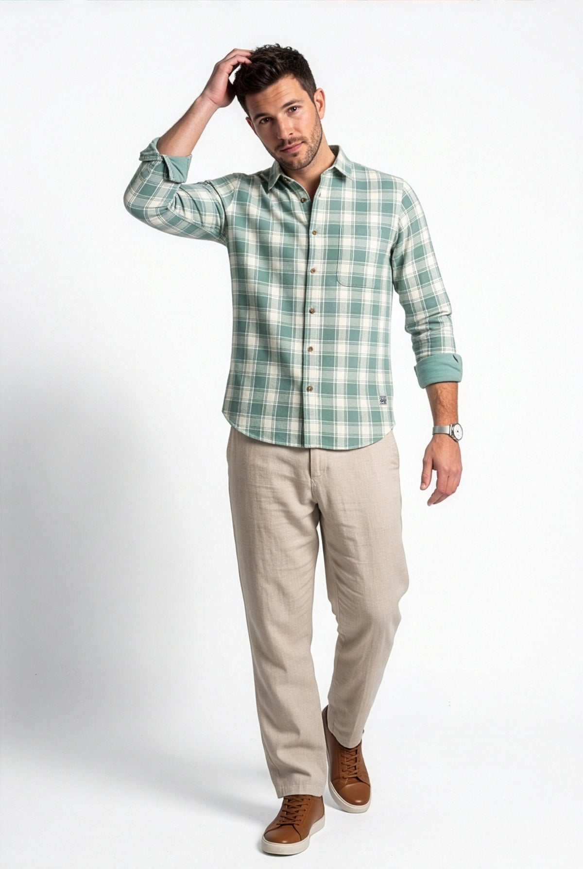 Three-quarter front view of men's green and cream plaid cotton dobby shirt