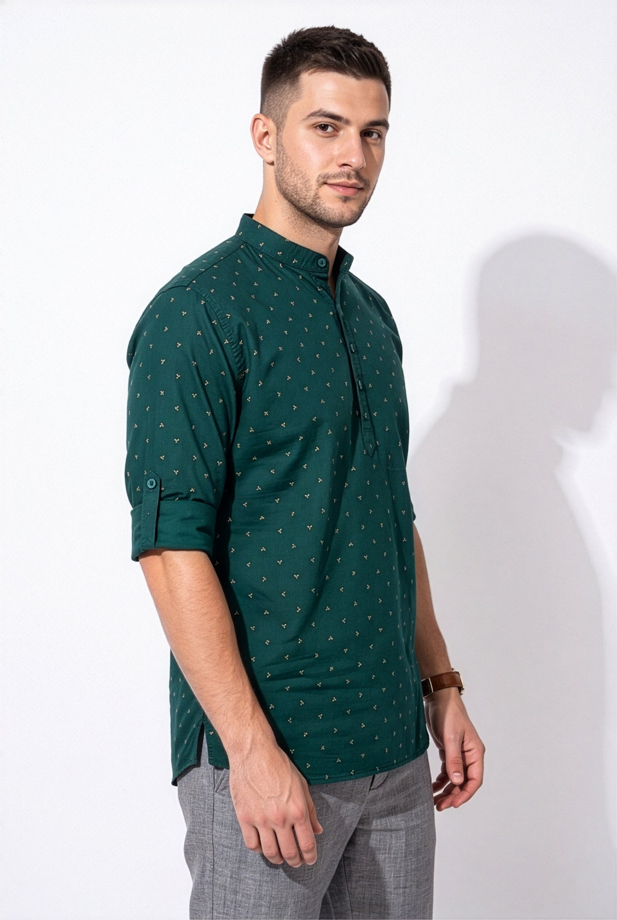 Deep teal-green printed short kurta, three-quarter view