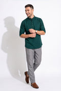 Deep teal-green printed short kurta, back view